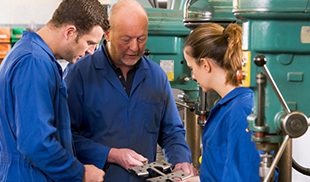 3 people working in a shop